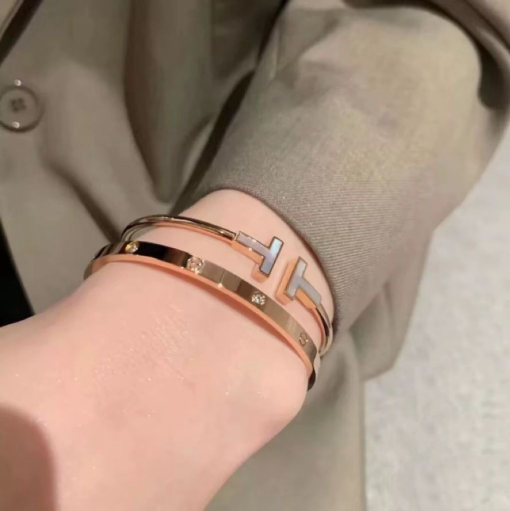 Tiffany & Co. T-Square Mother-of-Pearl Inset 18K Yellow Gold Bangle Bracelet – Retail Price: $3,292