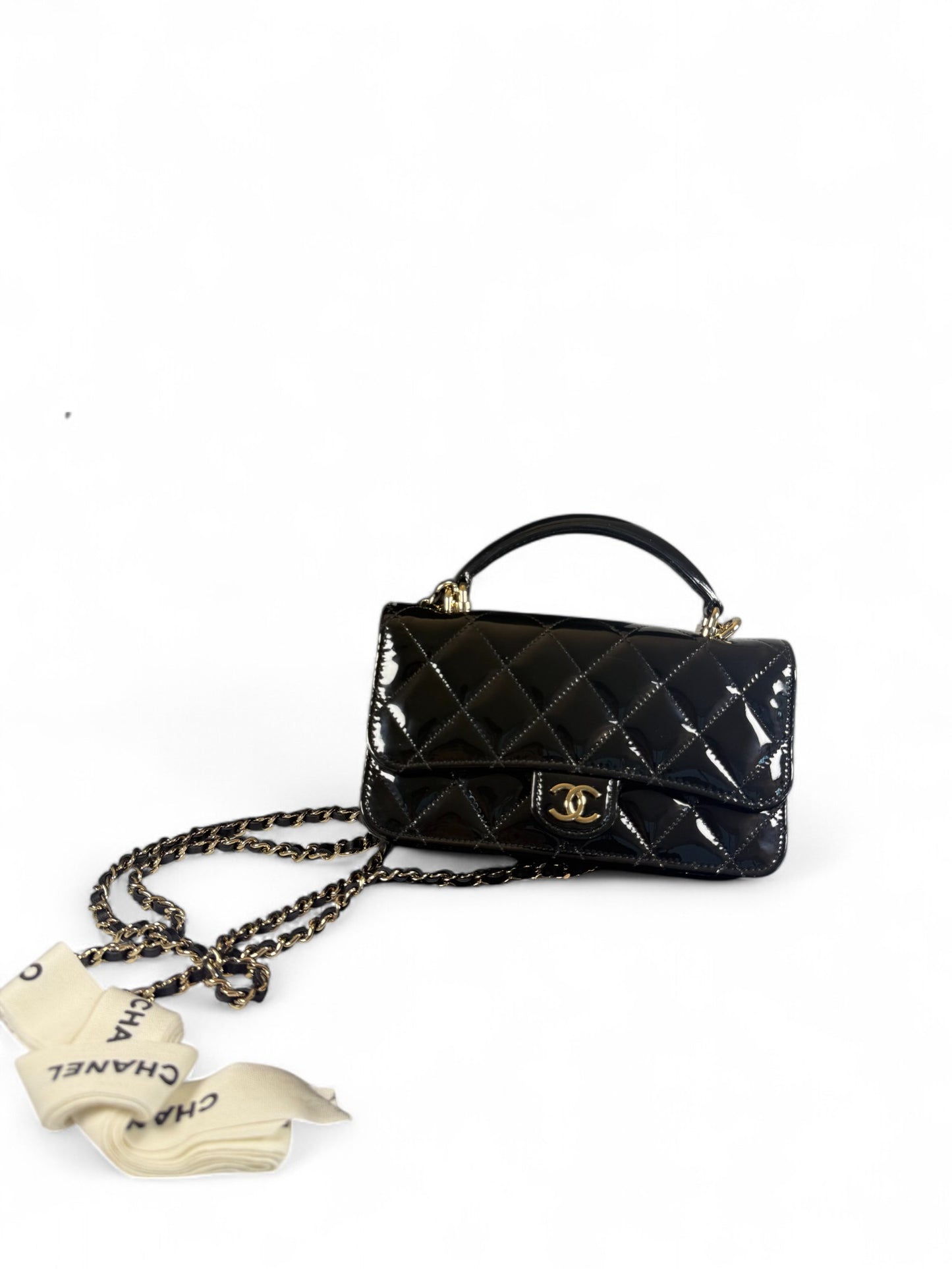 Chanel Black Patent Leather Mini Top Handle Flap Bag – Retail Price: $6,100