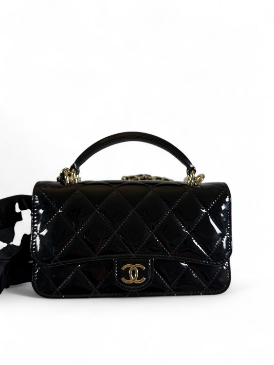 Chanel Black Patent Leather Mini Top Handle Flap Bag – Retail Price: $6,100