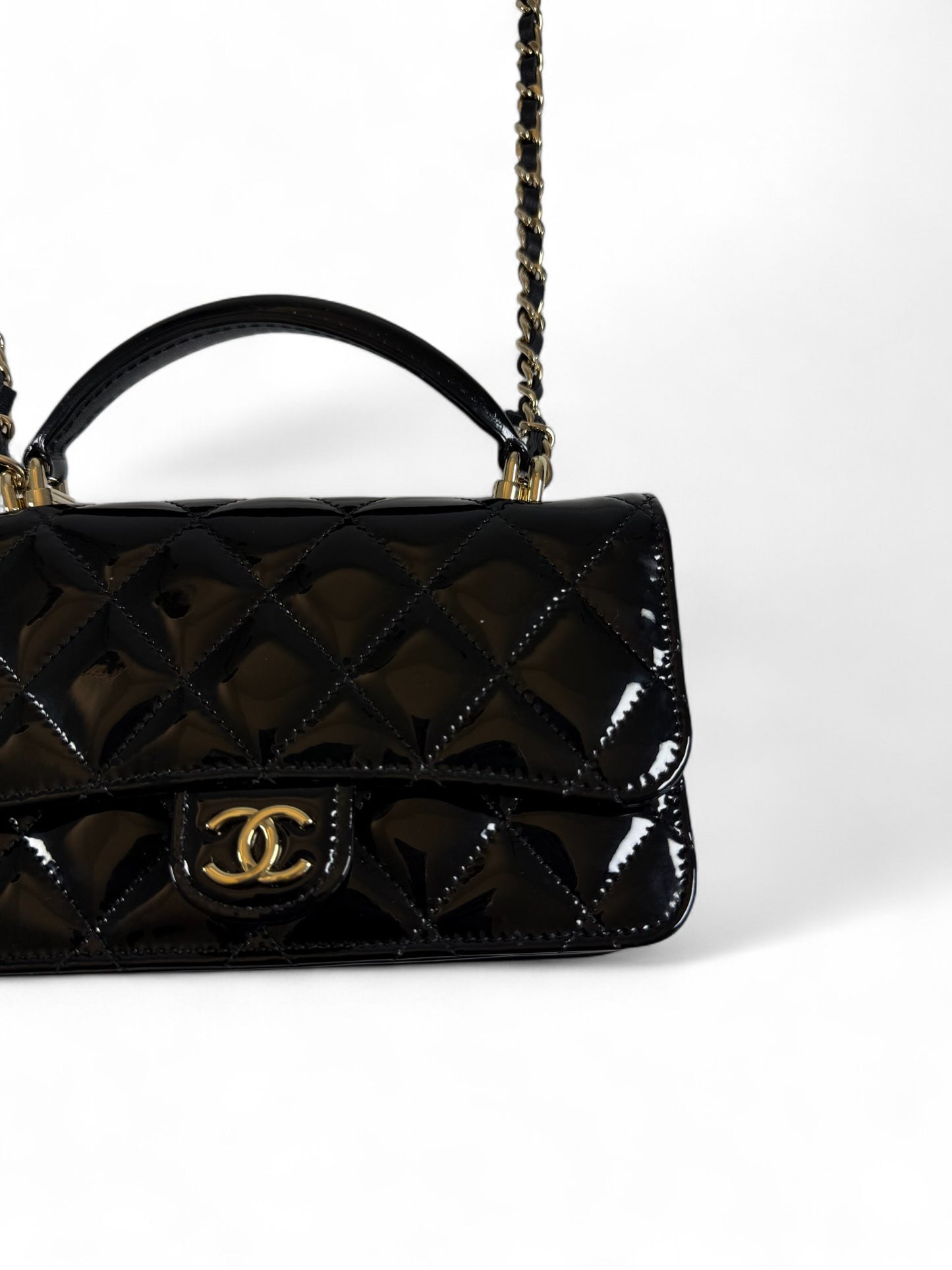 Chanel Black Patent Leather Mini Top Handle Flap Bag – Retail Price: $6,100